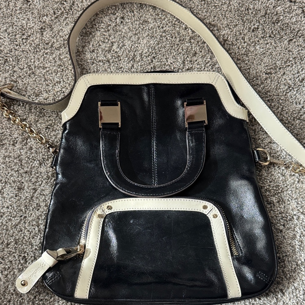B. Makowsky Black and Cream Backpack